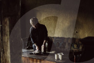 Man cutting Brown Bread for Breakfast