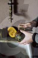  Wabi-Sabi Living Concept, Man uses the Vegetable Brush to clean a Pumpkin 
