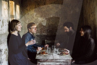 Four Friends enjoying a Dinner together