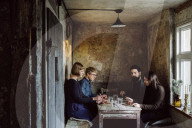 Four Friends enjoying a Dinner together