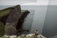 Woman enjoying View upon the Ocean at Neist Point