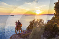 Young couple enjoys the sunset