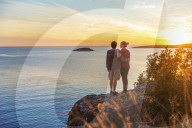 Young couple enjoys the sunset
