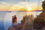 Young couple enjoys the sunset