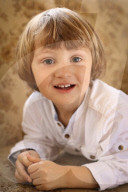 Portrait of a Boy wearing a white Shirt