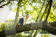 Girl climbing a Tree