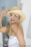 Young woman with straw hat
