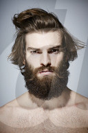 Bare-chested Man with Full Beard