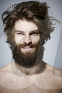 Bare-chested Man with Full Beard