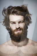 Bare-chested Man with Full Beard