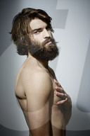 Bare-chested Man with Full Beard