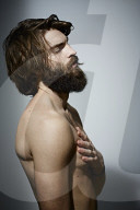 Bare-chested Man with Full Beard