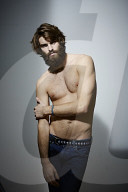 Bare-chested Man with Full Beard