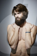 Bare-chested Man with Full Beard