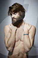 Bare-chested Man with Full Beard