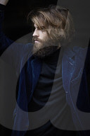 Portrait of a Man with Full Beard wearing a blue Jacket
