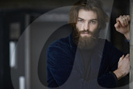 Portrait of a Man with Full Beard wearing a blue Jacket