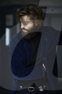 Portrait of a Man with Full Beard wearing a blue Jacket
