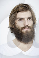 Portrait of a Man wearing a white T-Shirt