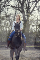 Woman enjoying her Leisure Time at a Riding Stable