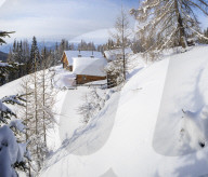 Snow covered Lungauer mountain huts