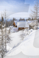Snow covered Lungauer mountain huts