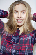 Young Woman wearing a checked Flannel Shirt