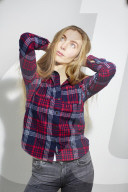 Young Woman wearing a checked Flannel Shirt