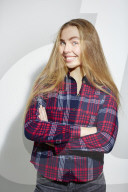 Young Woman wearing a checked Flannel Shirt
