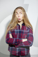 Young Woman wearing a checked Flannel Shirt