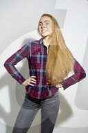 Young Woman wearing a checked Flannel Shirt