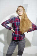 Young Woman wearing a checked Flannel Shirt