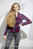 Young Woman wearing a checked Flannel Shirt