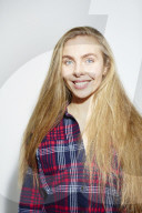 Young Woman wearing a checked Flannel Shirt