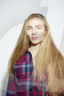 Young Woman wearing a checked Flannel Shirt