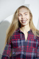Young Woman wearing a checked Flannel Shirt