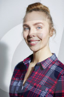 Young Woman wearing a checked Flannel Shirt