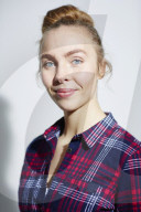 Young Woman wearing a checked Flannel Shirt