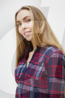 Young Woman wearing a checked Flannel Shirt