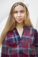 Young Woman wearing a checked Flannel Shirt