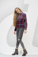 Young Woman wearing a checked Flannel Shirt