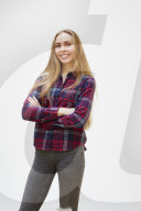 Young Woman wearing a checked Flannel Shirt