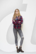 Young Woman wearing a checked Flannel Shirt