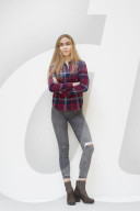 Young Woman wearing a checked Flannel Shirt