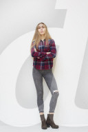 Young Woman wearing a checked Flannel Shirt