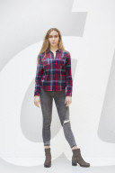 Young Woman wearing a checked Flannel Shirt