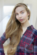 Young Woman wearing a checked Flannel Shirt