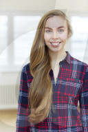Young Woman wearing a checked Flannel Shirt