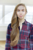 Young Woman wearing a checked Flannel Shirt