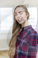 Young Woman wearing a checked Flannel Shirt